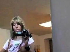 Girl with video camera play her pussy