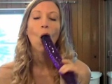 She takes a huge dildo in her ass